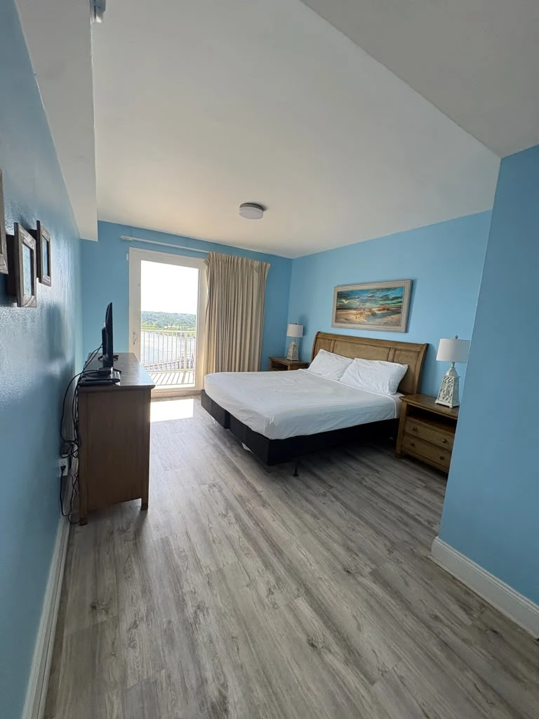 Master bedroom before repainting showing electric blue walls
